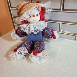 Hand made doll with wooden block
